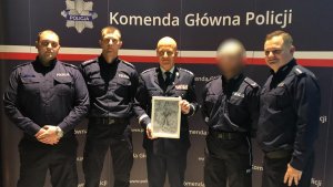 Policjanci, który nagrali piosenkę &quot;Dumny z bycia psem&quot; na spotkaniu z Komendantem Głównym Policji.